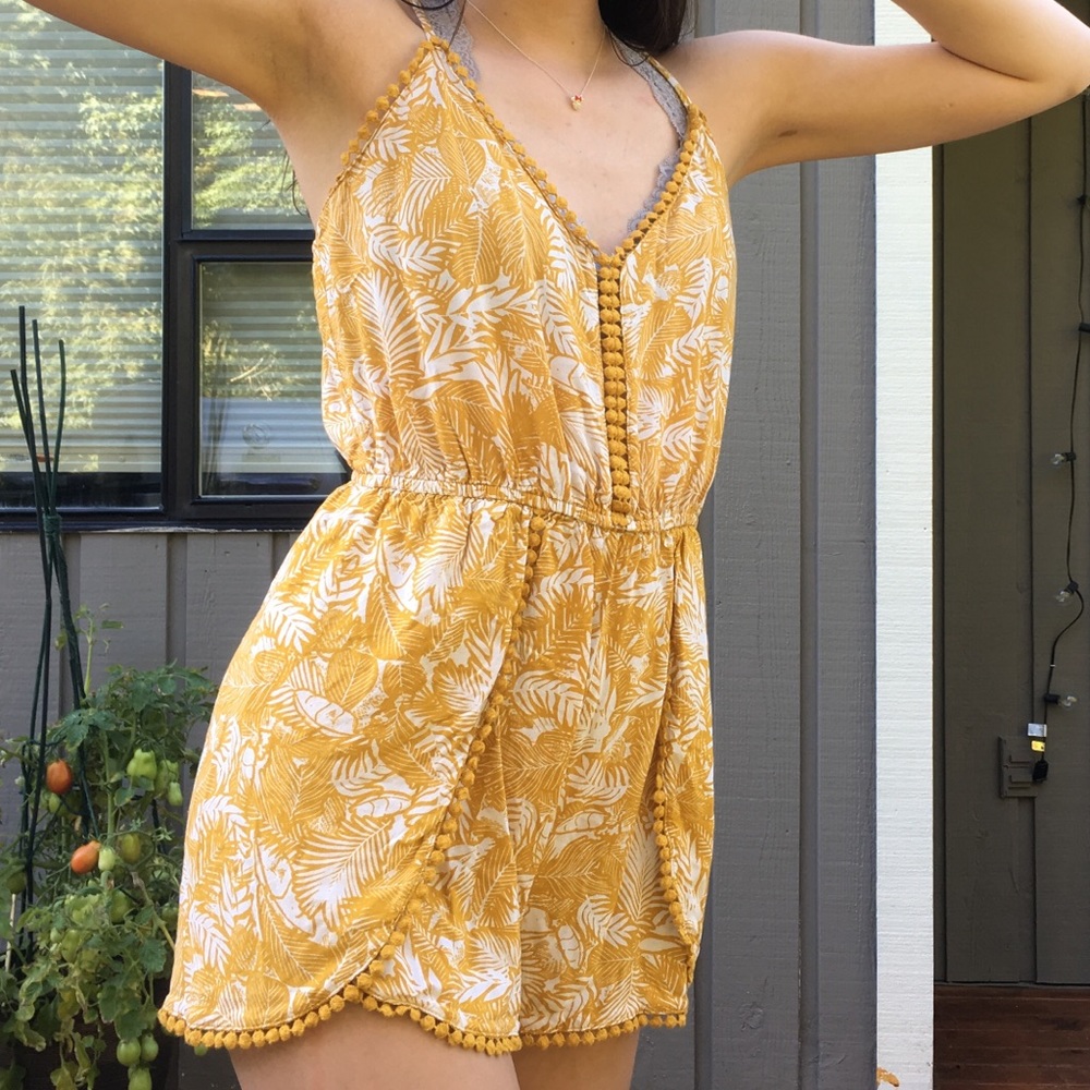 Yellow floral print romper